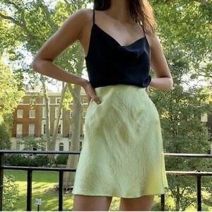 Aritzia Pistachio green babaton silk mini skirt
